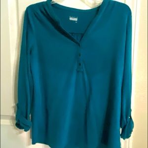 A beautiful green  long sleeve shirt